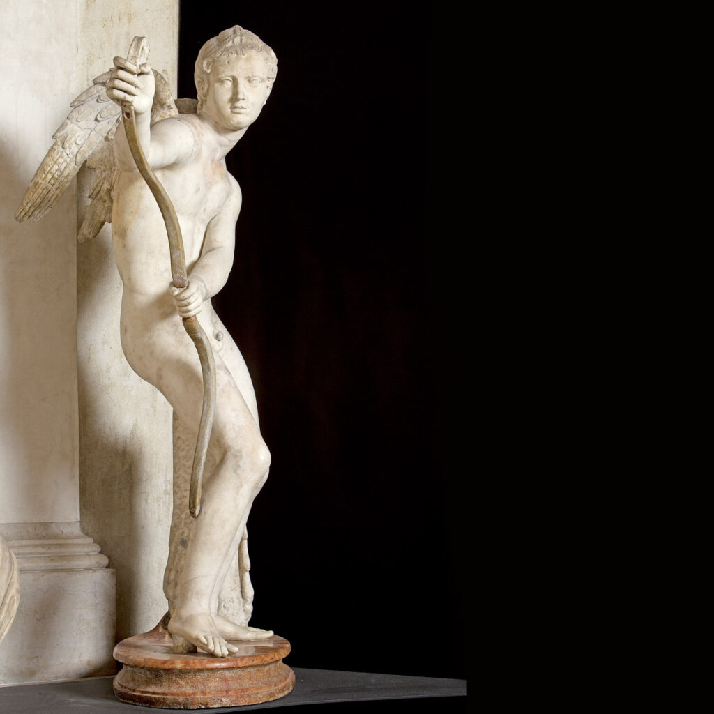 Marble statue of Eros stringing his bow. It is considered one of the closest copies to the bronze original work created by Lysippos in 335 BC.