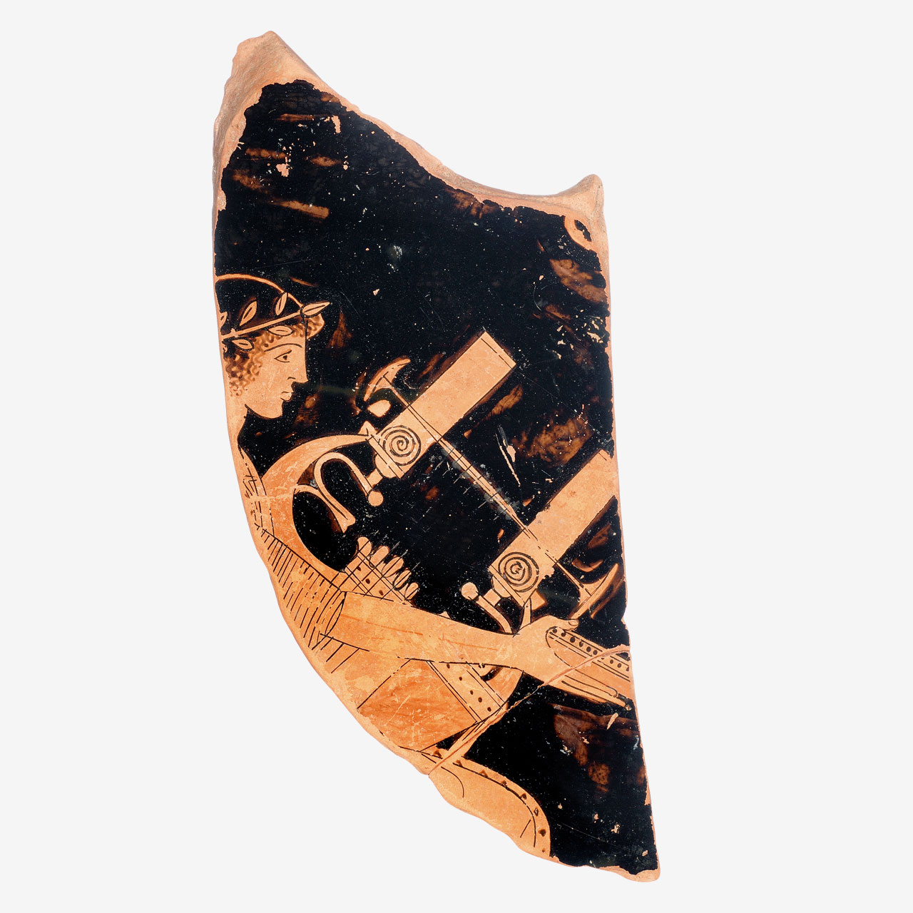 Fragment of a clay red-figured krater with representation of Apollo kitharodos (singing and playing the kithara).