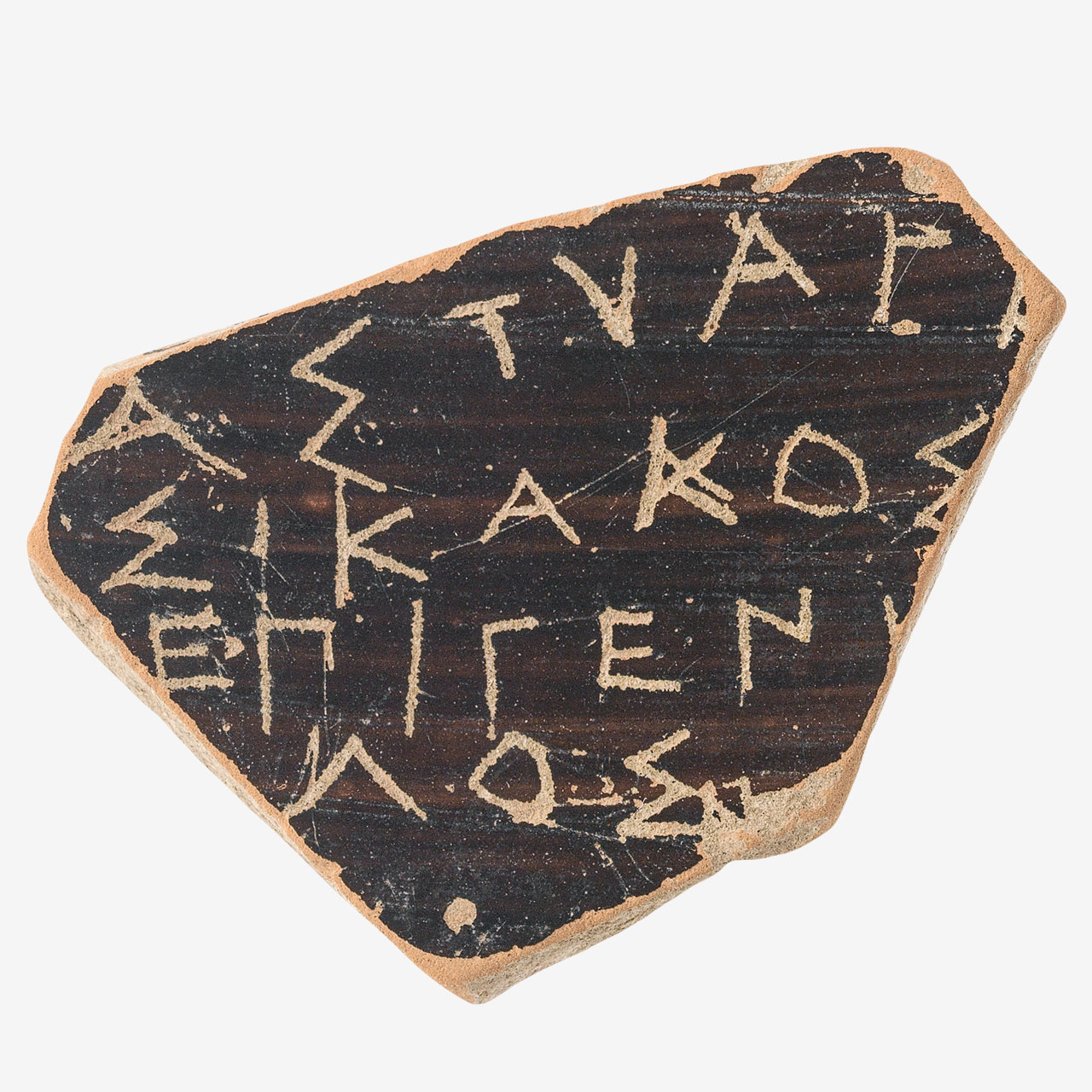 Inscribed sherd of a black-glazed skyphos with the inscription “Astyages is bad, Epigenes is good”. In the initial writing Astyages was characterized as καλός (good, worthy, handsome), which epithet was subsequently changed to the opposite, κακός (bad).
