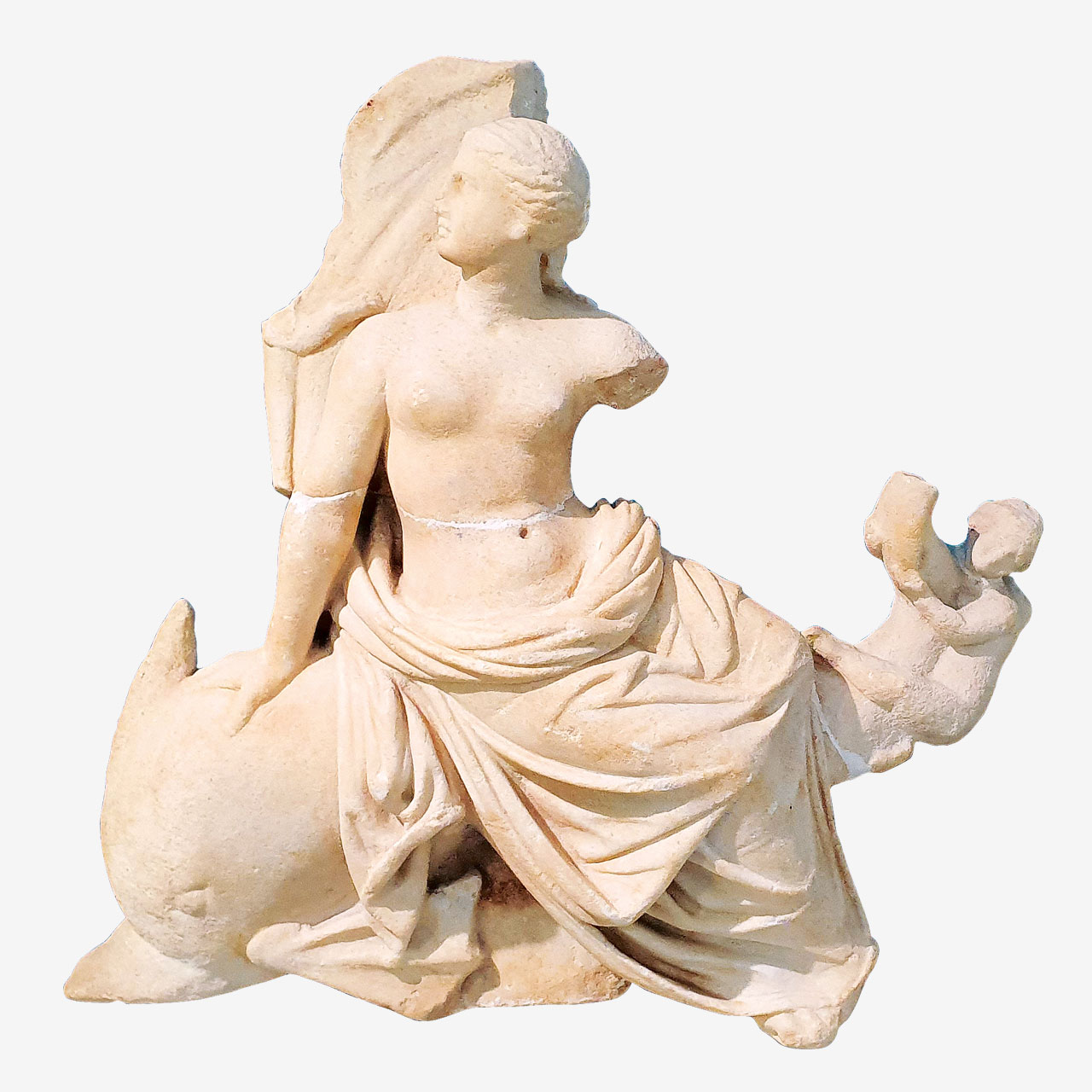 Marble statuette of Aphrodite riding a dolphin.